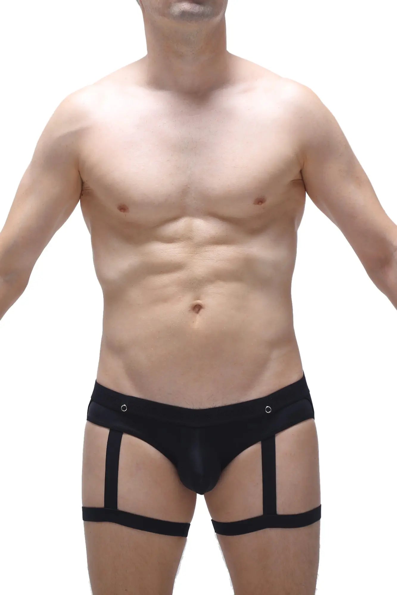 Black jockstrap garter brief with form-fitting strappy design and metallic grommets at waistband front view