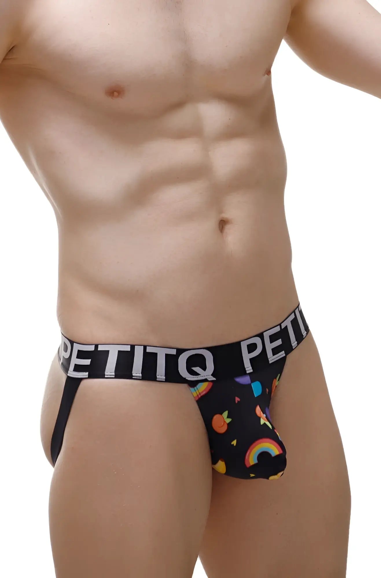 Black petitq men’s briefs jockstrap taik sitges with playful rainbow and fruit pattern on the front
