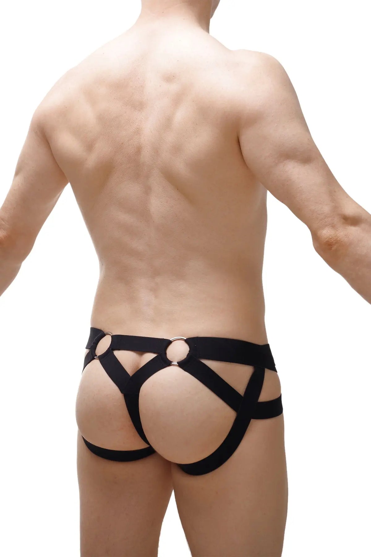 Black leather harness-style jock thong briefs with circular metal rings from bust petitq 2023 collection