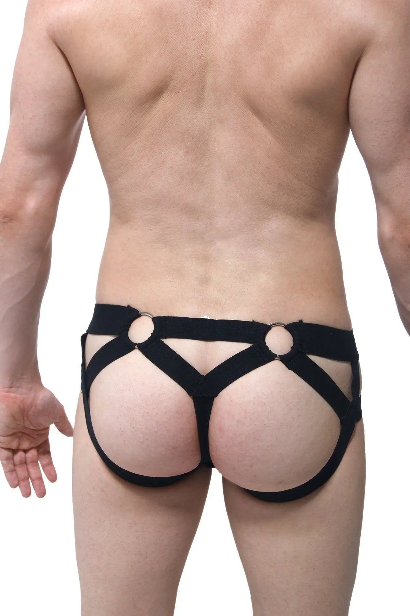 Back view of black elasticated jockthong bust petitq underwear with circular metal rings and harness-style design