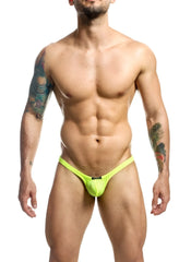 Bright neon green mesh joe snyder bulge thong holes showing back with small black brand tag
