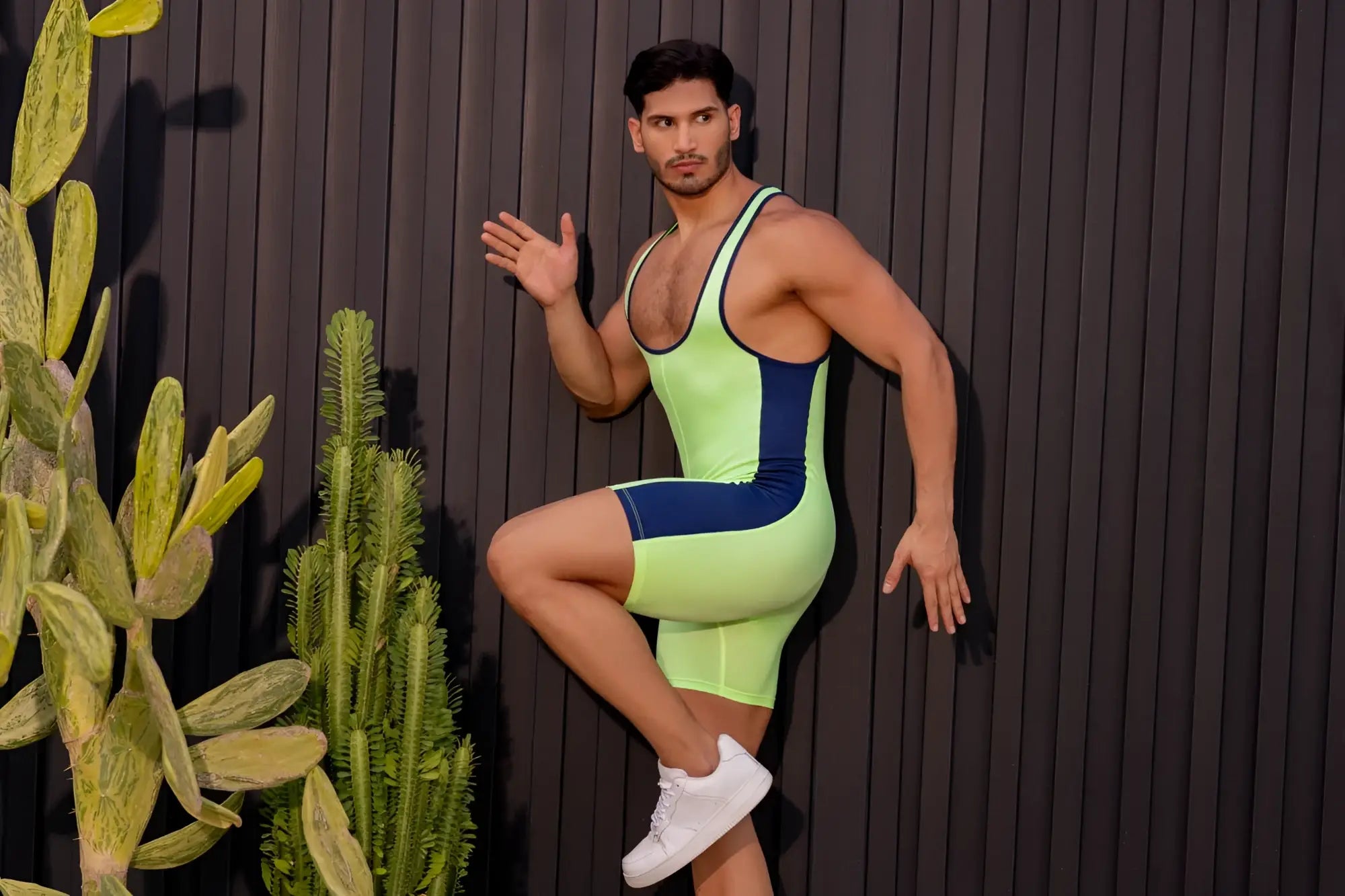 Neon green and navy blue jor 2216 fighter bodysuit with sleek form-fitting design for athletic use