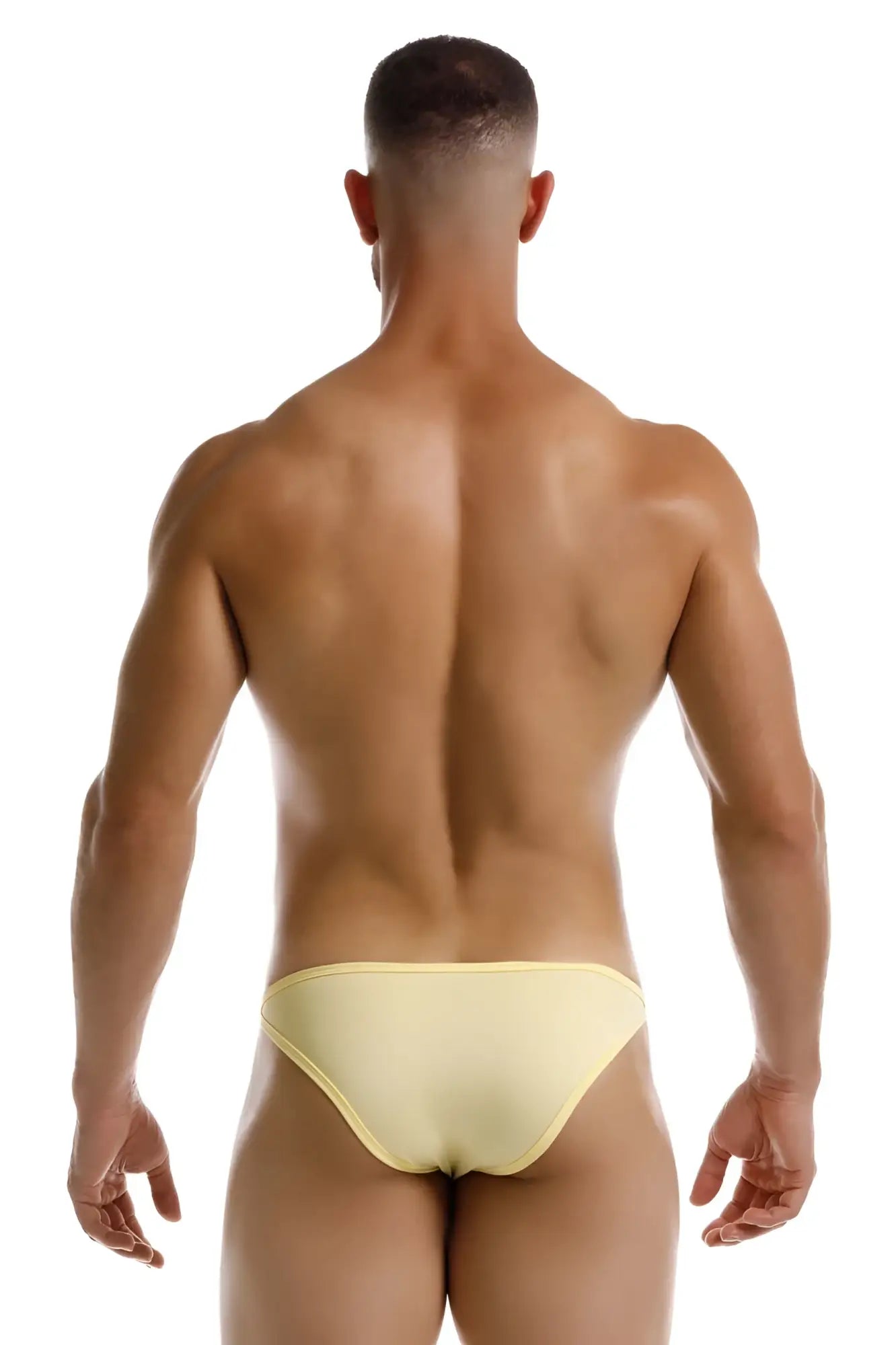 A sleek pale yellow jor 2257 axel bikini brief with smooth form-fitting design perfect for swimwear use