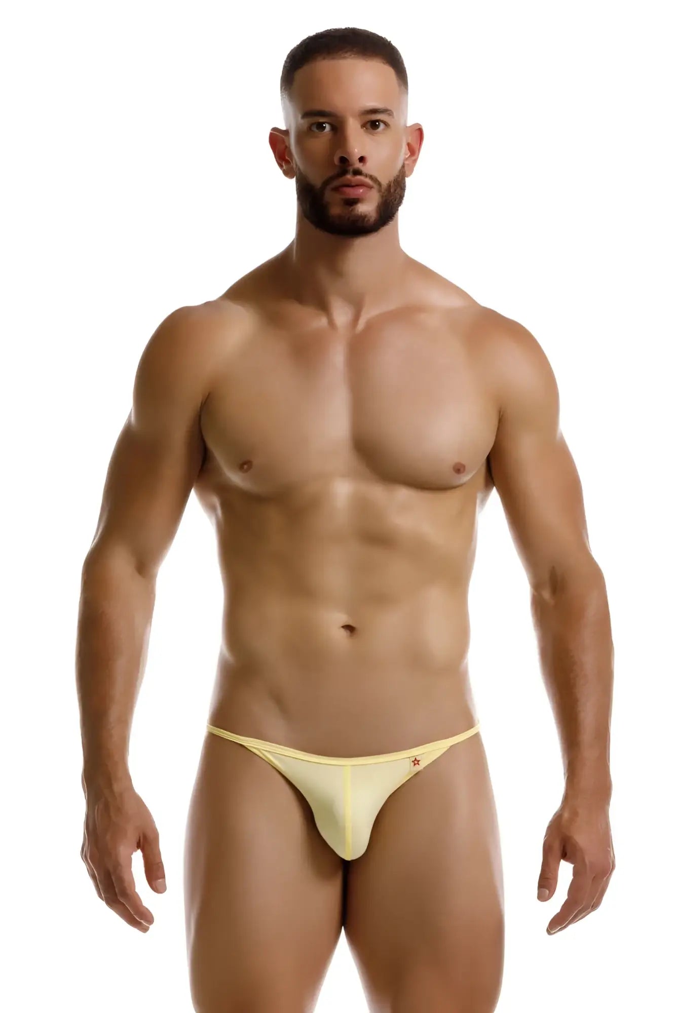 A pale yellow form-fitting thong with a subtle red logo on the left hipband jor 2258 axel g-string