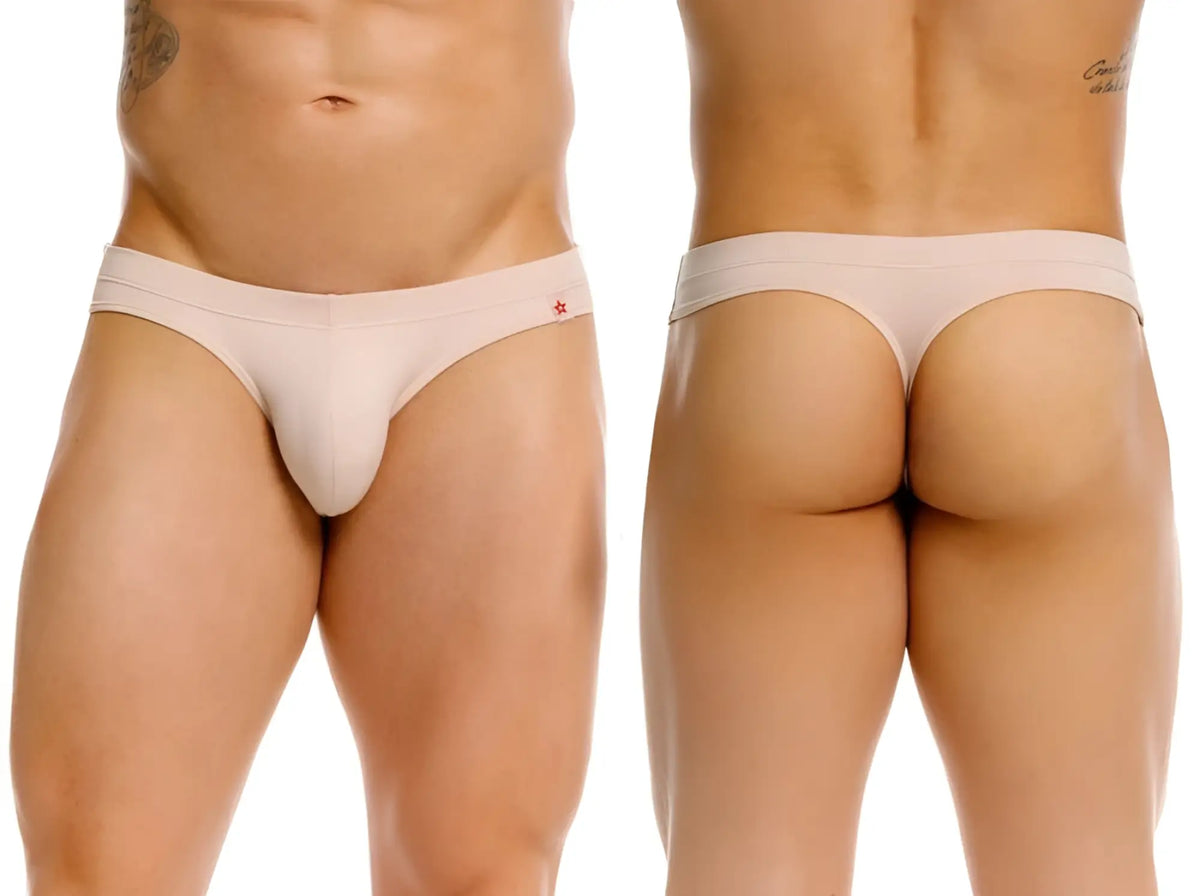 Beige invisible thong with a small red star logo on the waistband from jor 2349 shown from the back side