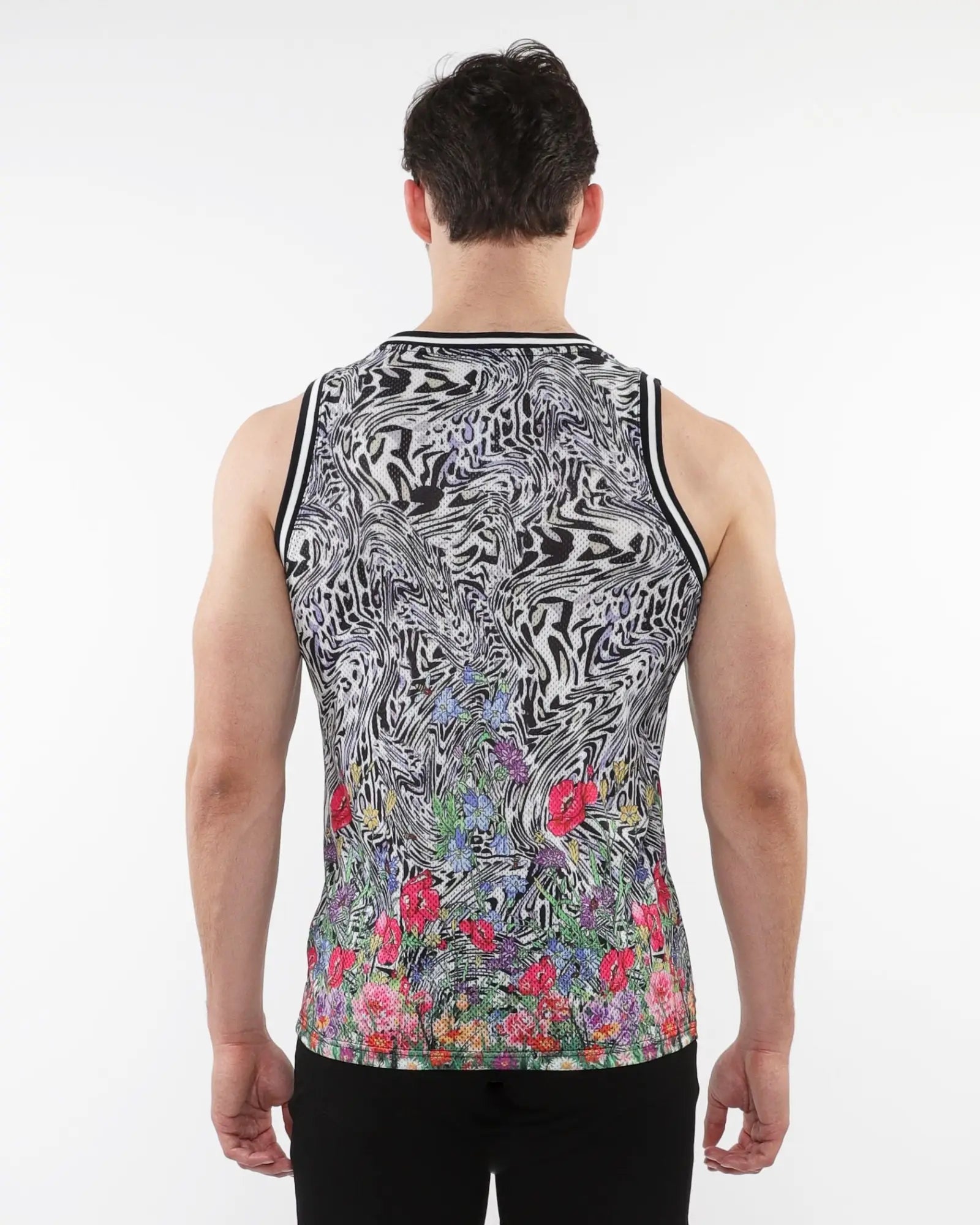 Jungle printed mesh tank with stripe ribbing black and white abstract swirl pattern and colorful floral print bottom