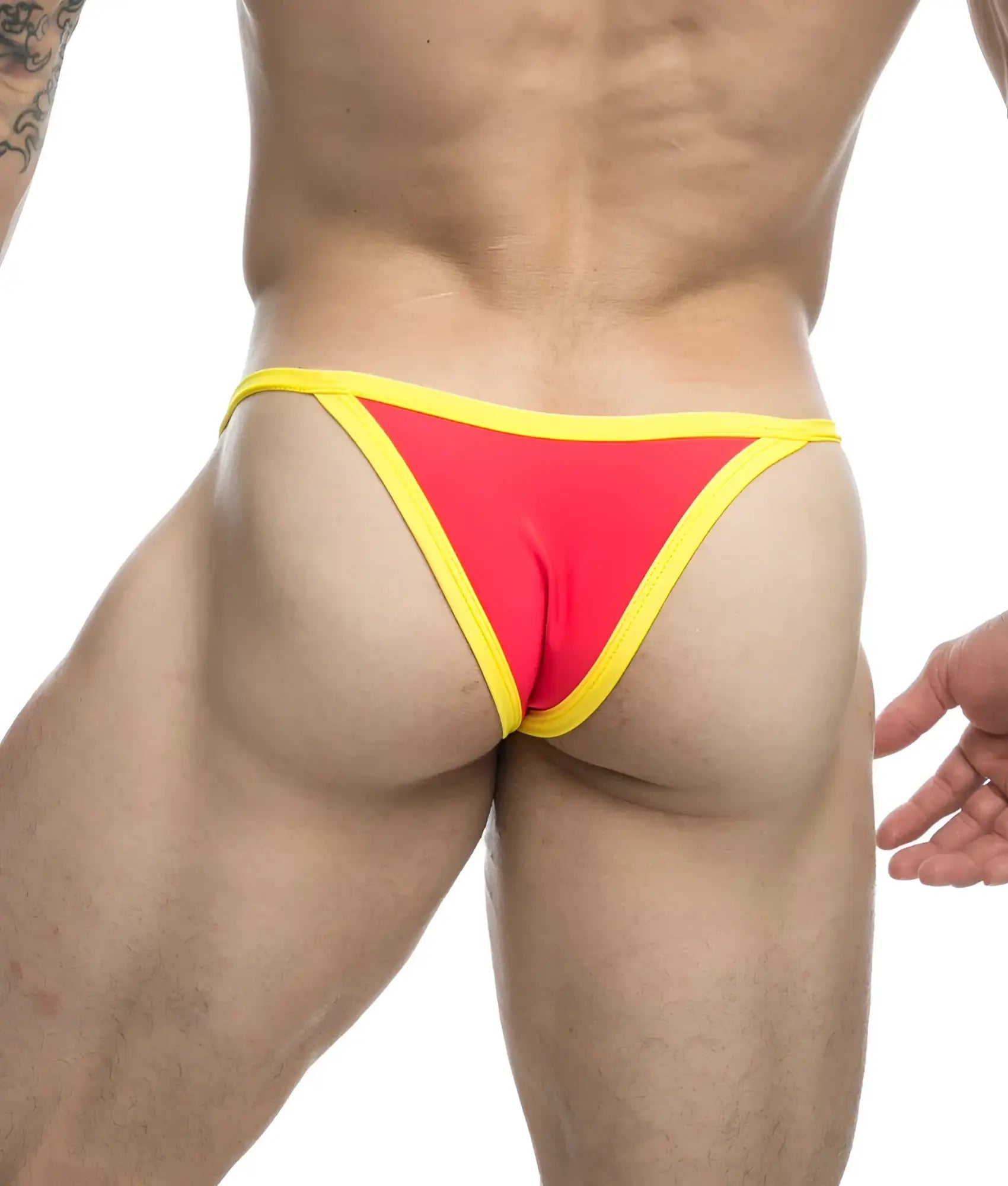 Vibrant red and yellow thong bikini one by justin + simon with snug form-fitting design shown from the back