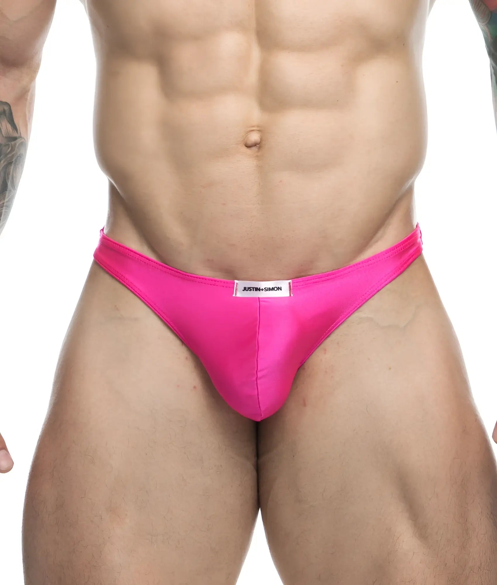Vibrant pink satin briefs with sleek form-fitting design and white brand label at waistband from Justin plus Simon Classic Tanga