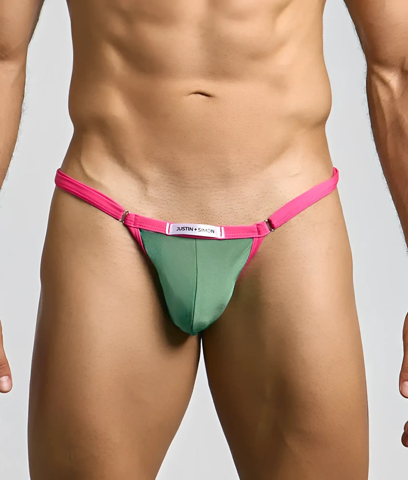 Bright pink and sage green justin and samson thong with sleek minimalist design in the justin plus simon bikini