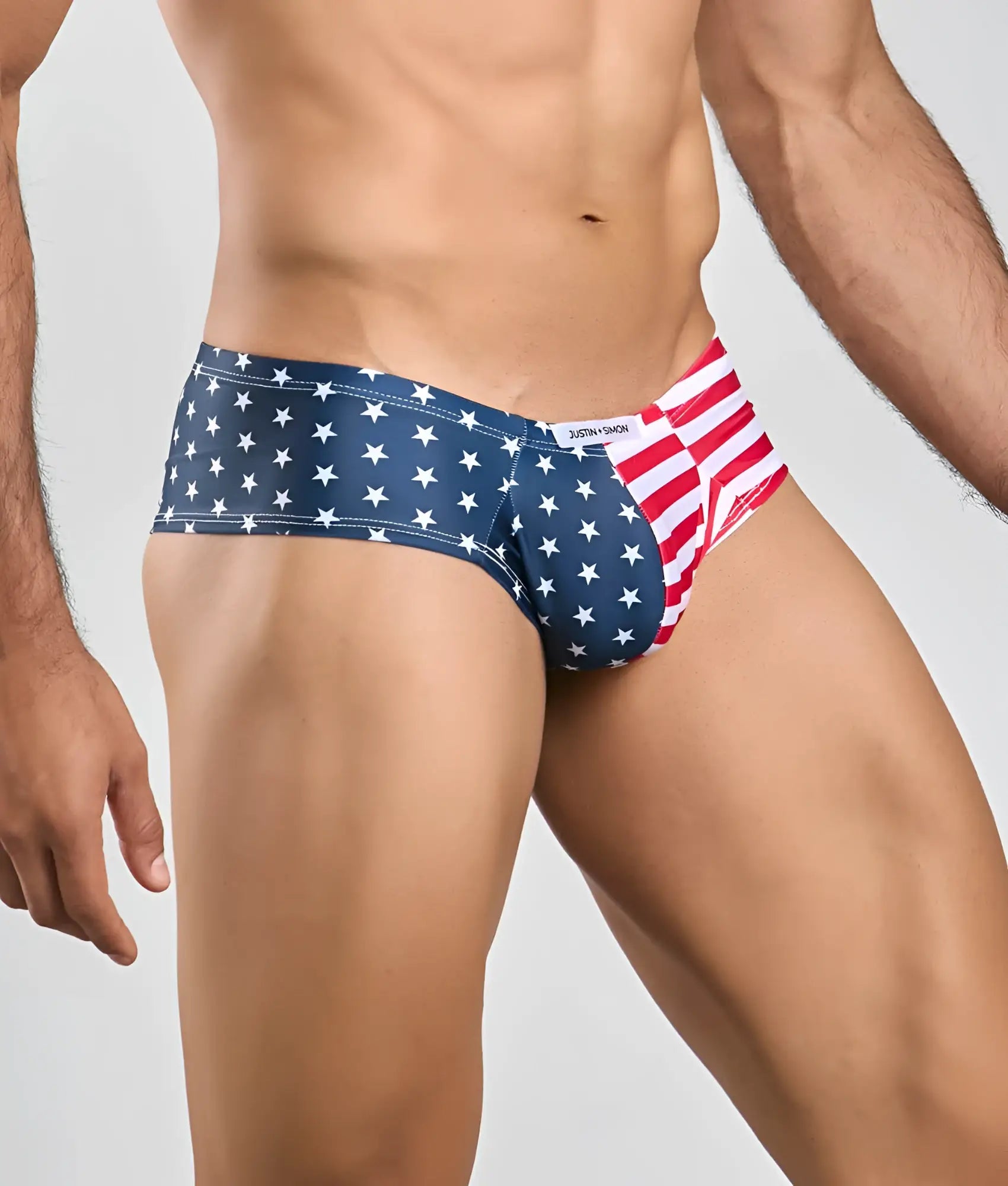 Justin Simon cheek briefs in blue and red american flag pattern with white stars for patriotic wear