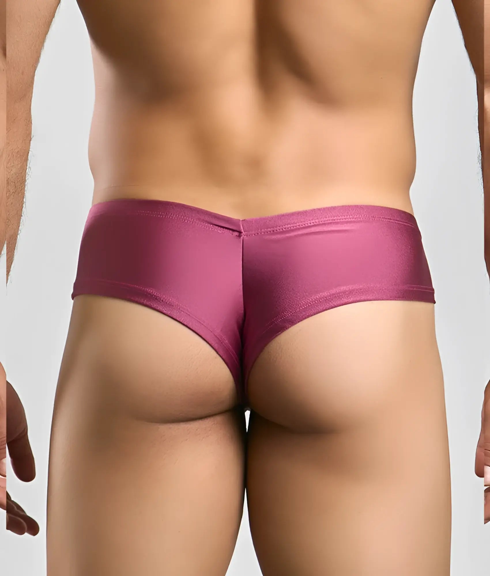 A sleek magenta satin brief with a smooth shiny finish and low-rise cut from Justin Simon Cheek collection