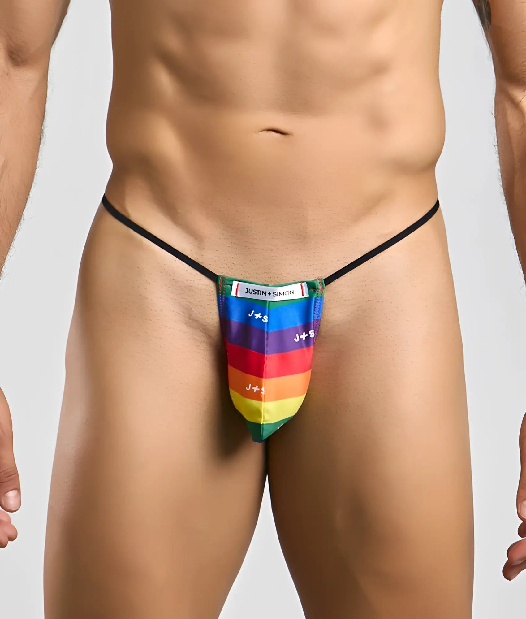 Justin and Simon classic g-string bulge with rainbow-striped thong and black elastic waistband featuring j+ s branding