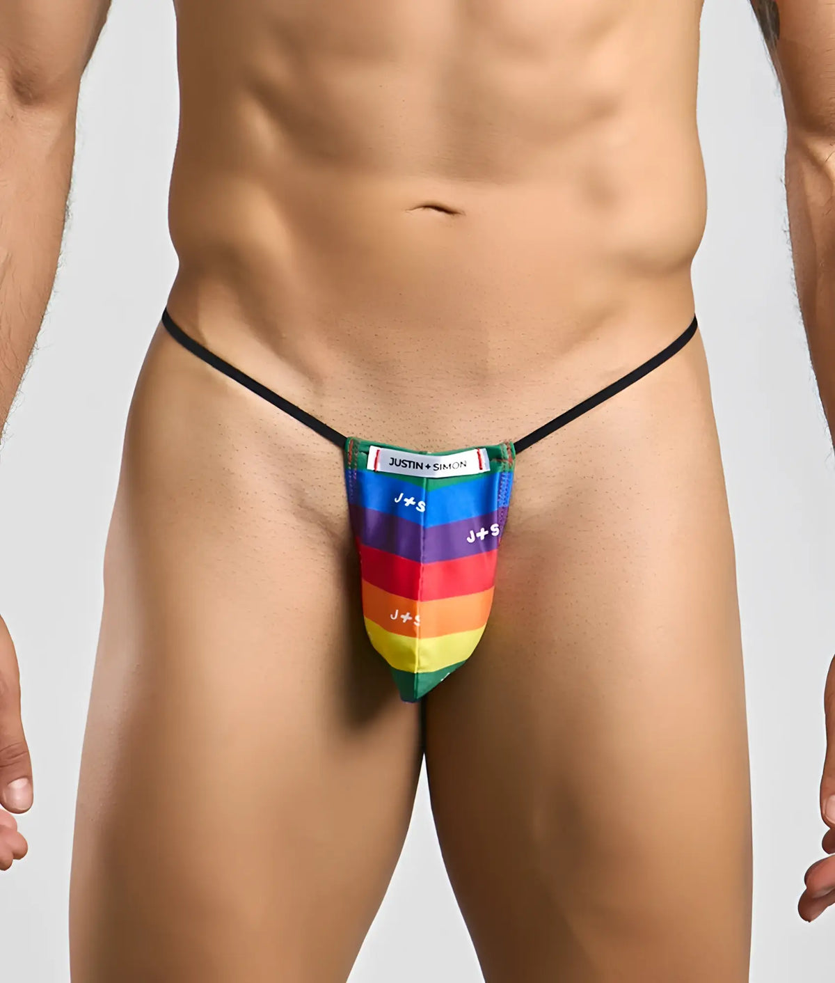 Justin and Simon classic g-string bulge with rainbow-striped thong and black elastic waistband featuring j+ s branding