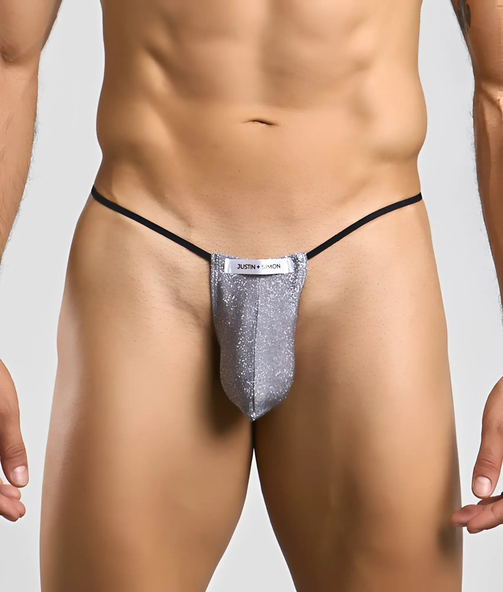 Silver glittery thong with black elastic waistband and justin simon label from Justin plus Simon Classic G-String Bulge collection