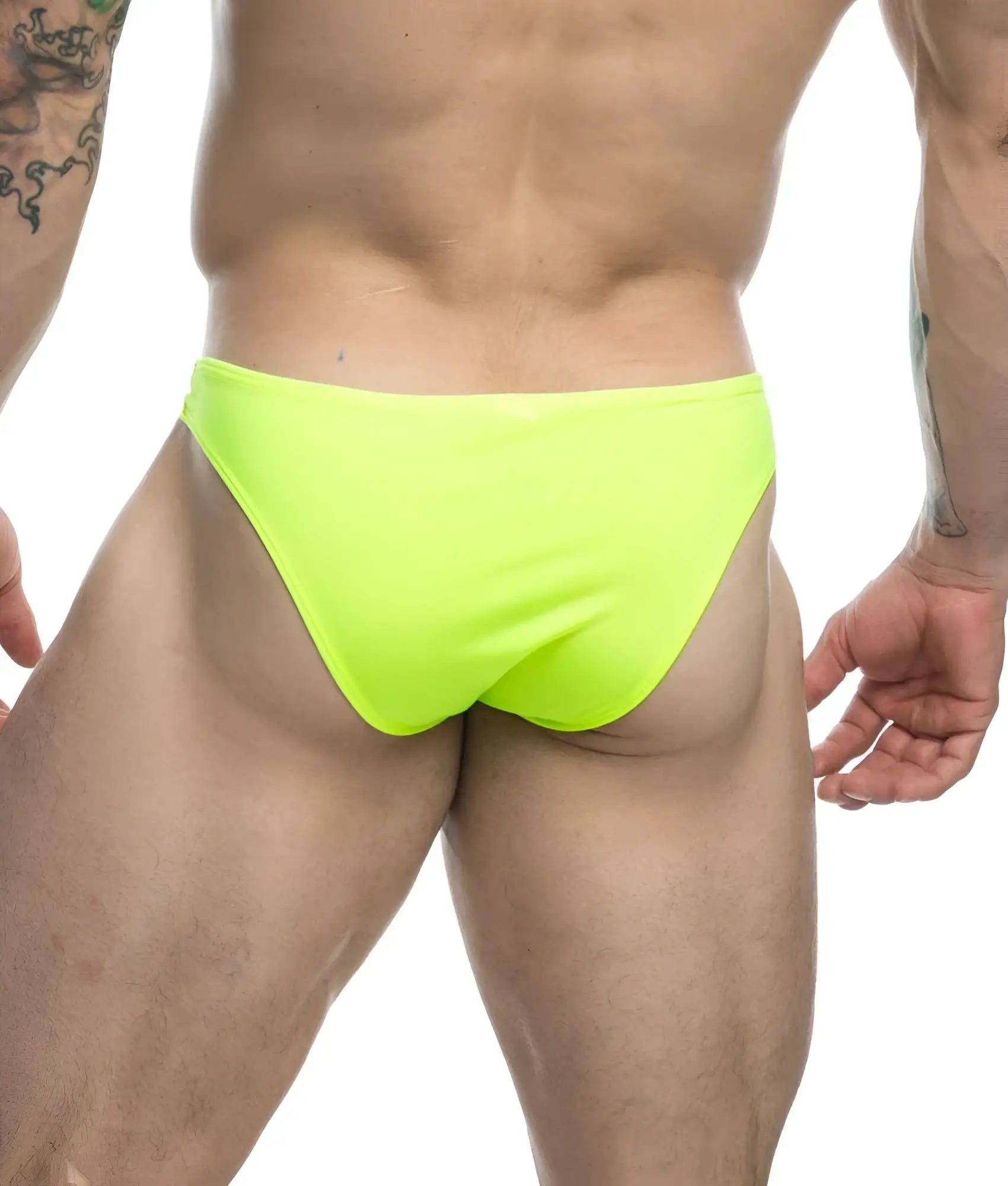 Justin + Simon classic mens bikini briefs in bright neon green featuring a comfortable stretch fabric design