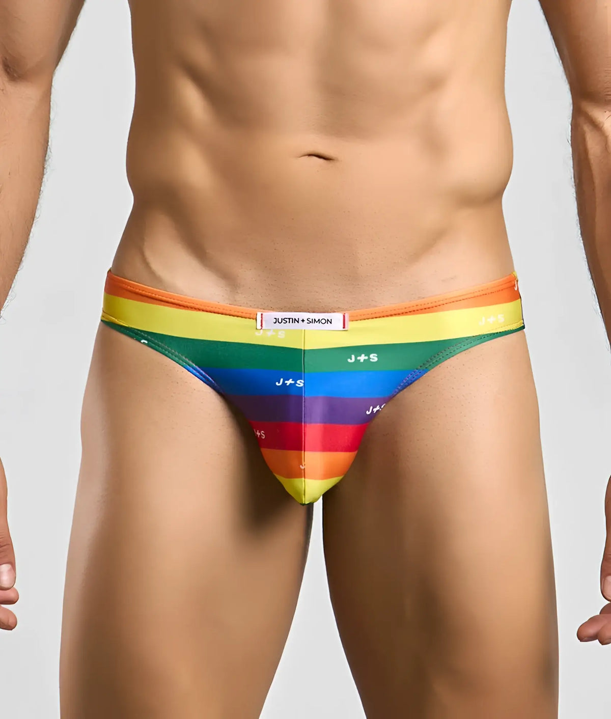 Justin + Simon classic mens bikini briefs in rainbow stripes with vibrant orange to purple gradient