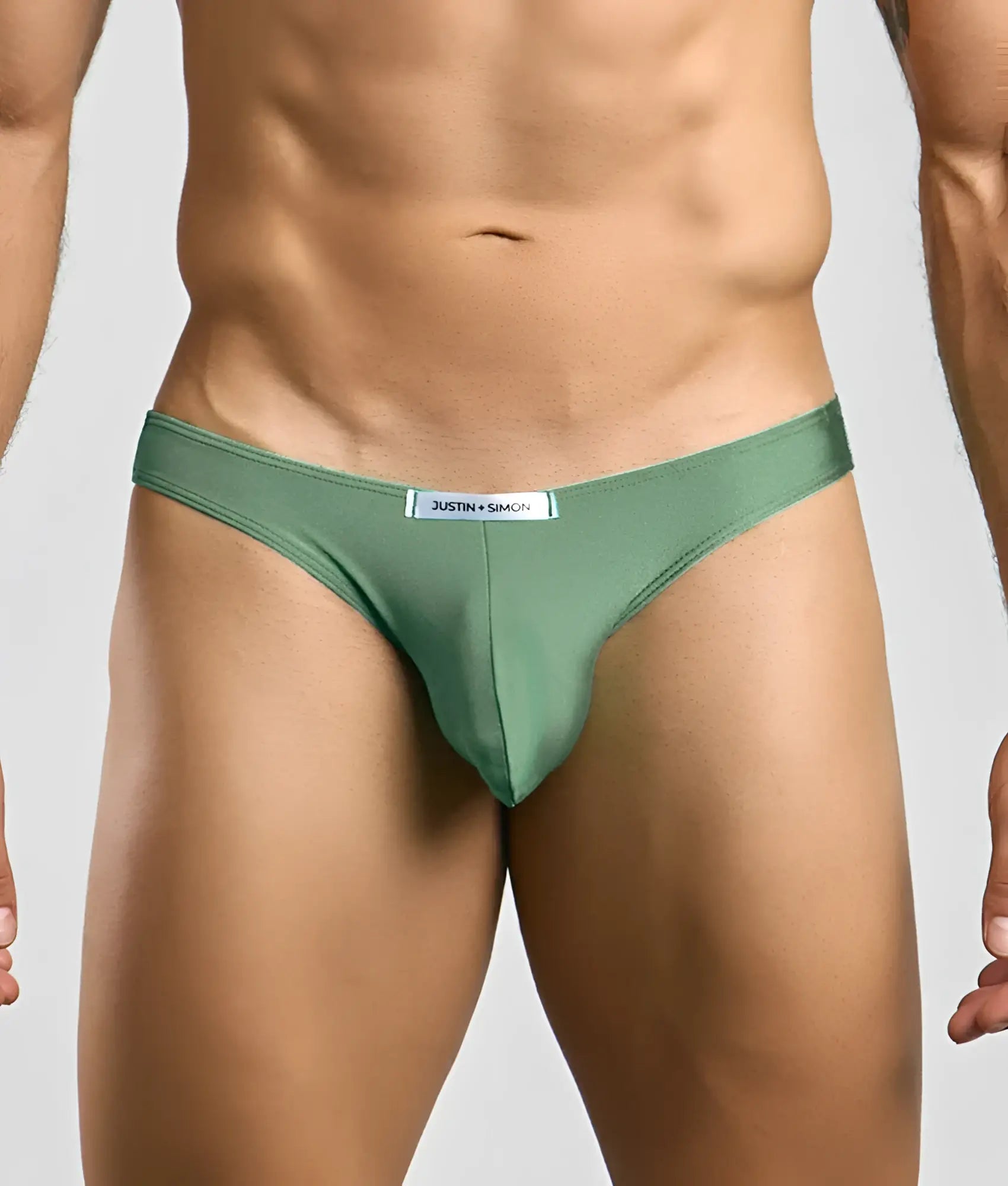 Justin plus simon classic mens bikini olive green thong made of smooth fabric with subtle sheen and branded waistband label