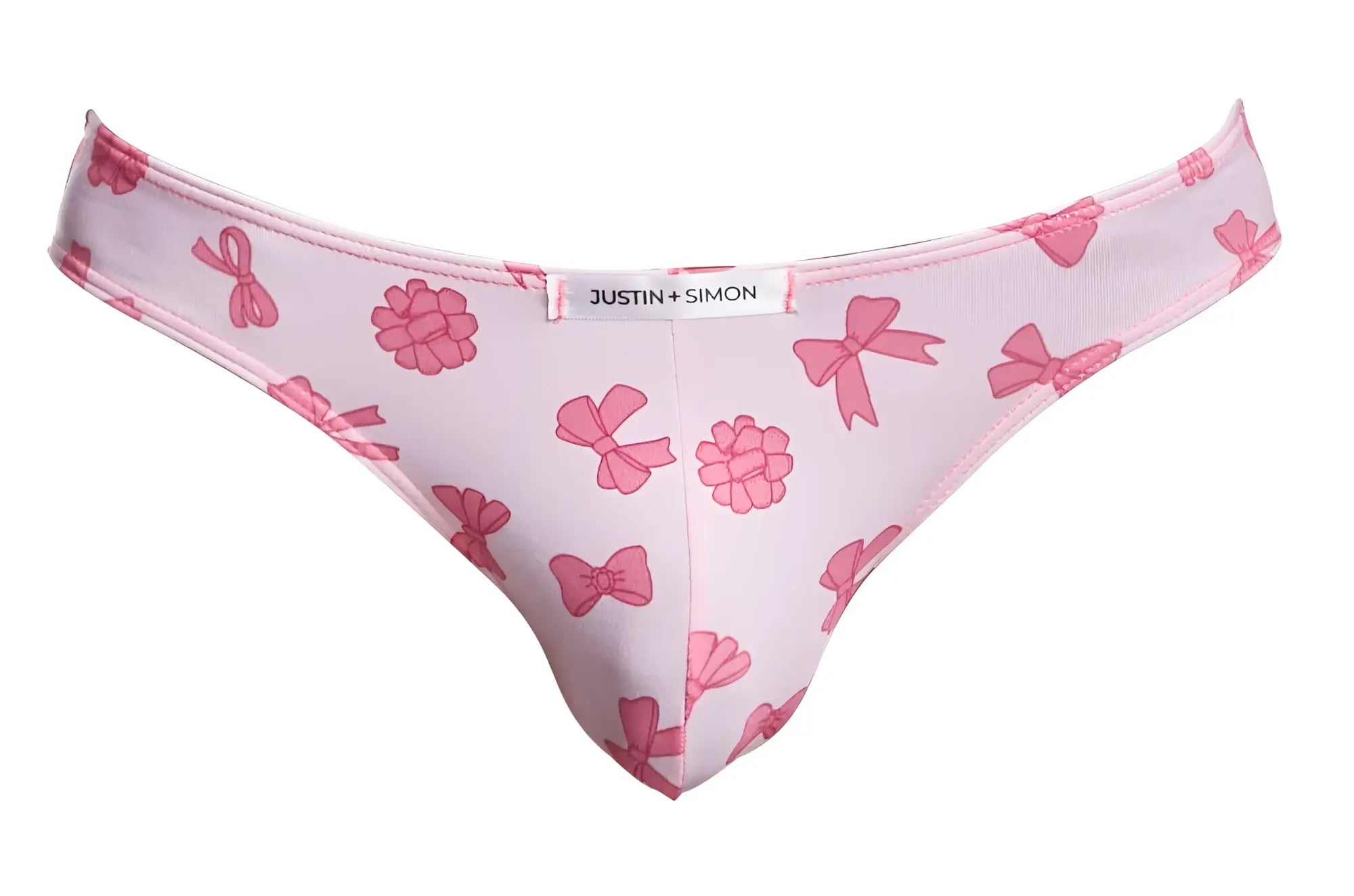Pink patterned thong with bow and raspberry designs featuring a white justin simon label in classic bikini style