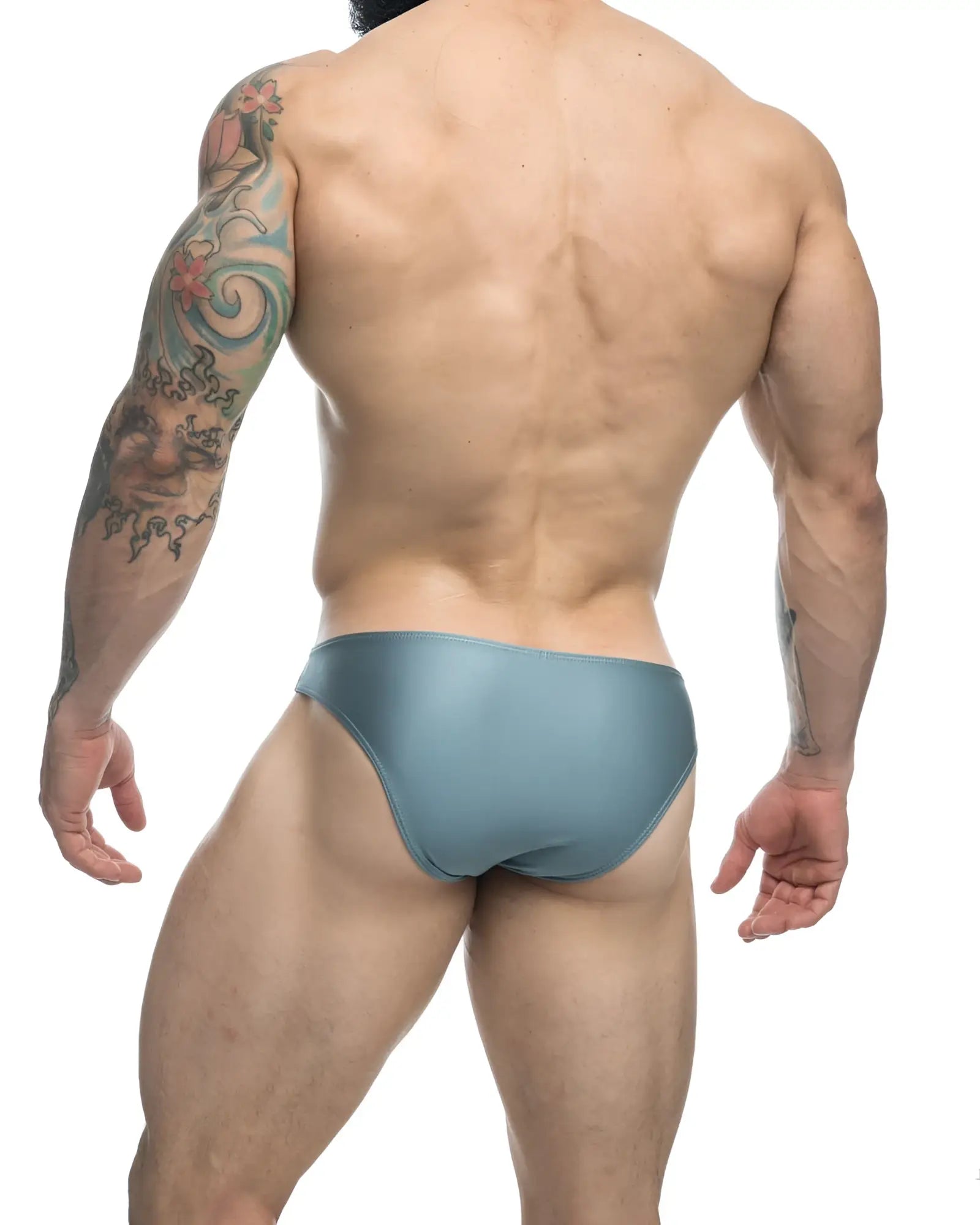 A sleek teal classic bikini swim brief with satin finish in metal green by JUSTIN SIMON XSJ01