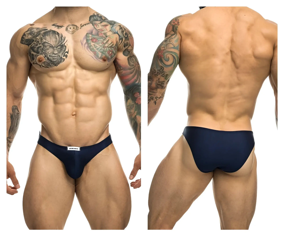 Navy blue classic bikini briefs by Justin Simon with a small white brand tag at the waistband for athletic wear