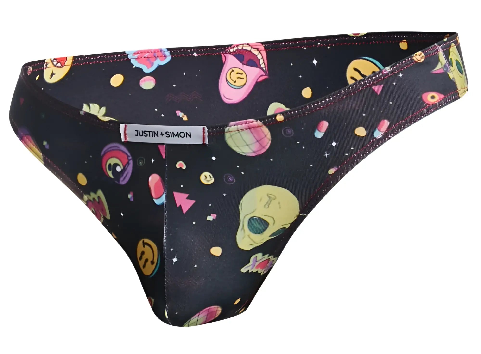 Black justin simon thong bikini with vibrant cosmic pattern featuring colorful alien faces skulls and space graphics
