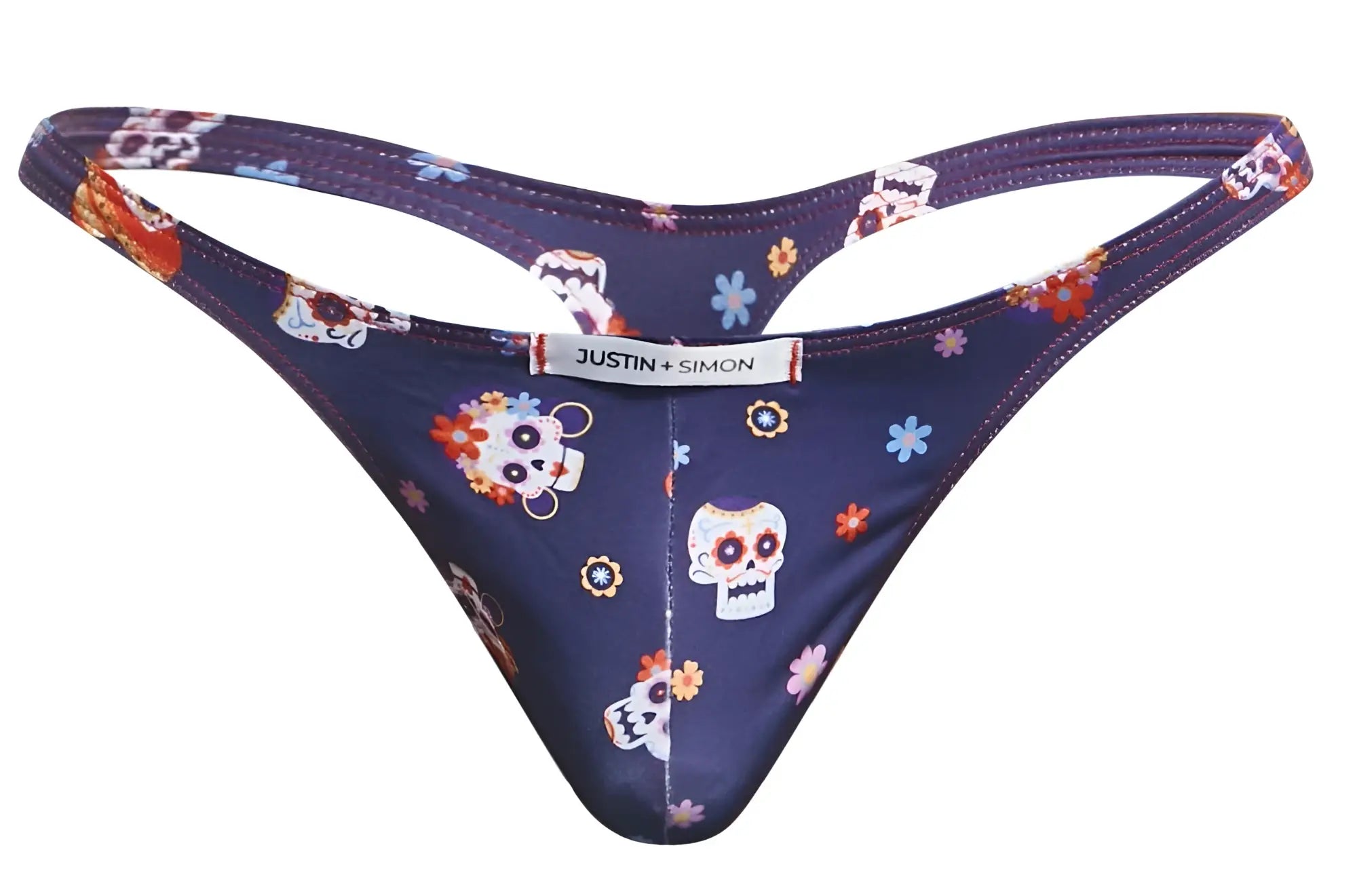 Dark blue classic thong with sugar skull floral pattern and justin simon label in mexico color scheme back view