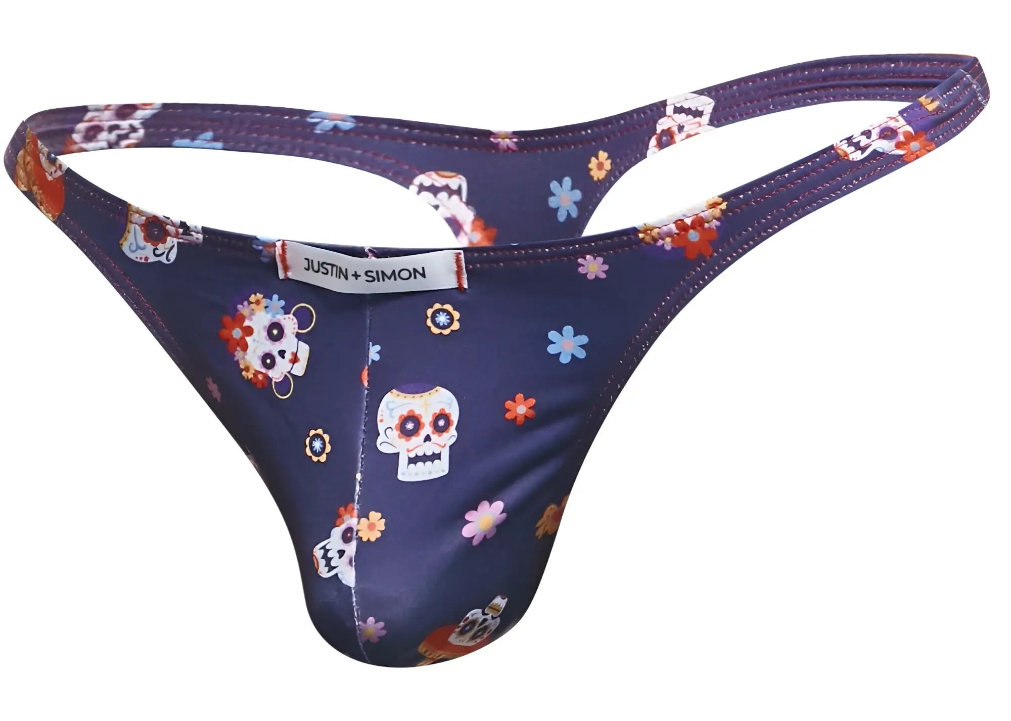 Dark blue classic thong with vibrant sugar skull floral pattern and justin simon label in mexico color