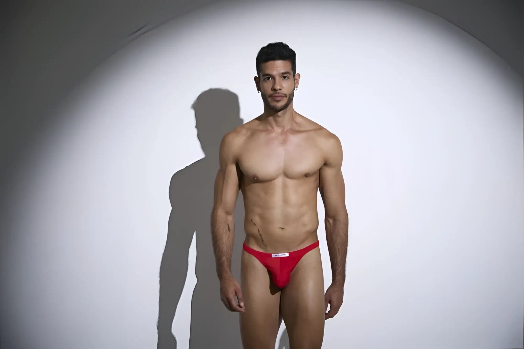 Justin simon xsj03 classic red athletic briefs with a small white logo on the front for active wear