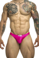 Bright pink satin briefs with a white brand tag at the waistband from JUSTIN+SIMON XSJ03 classic thongs collection
