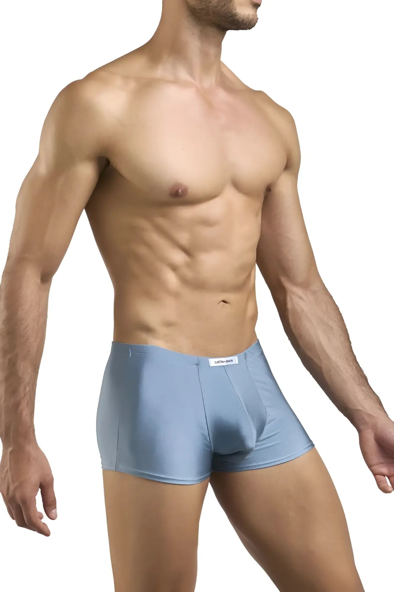 Light blue form-fitting boxer briefs with subtle textured fabric and white brand tag from JUSTIN+SIMON XSJ08 Classic Metal Green