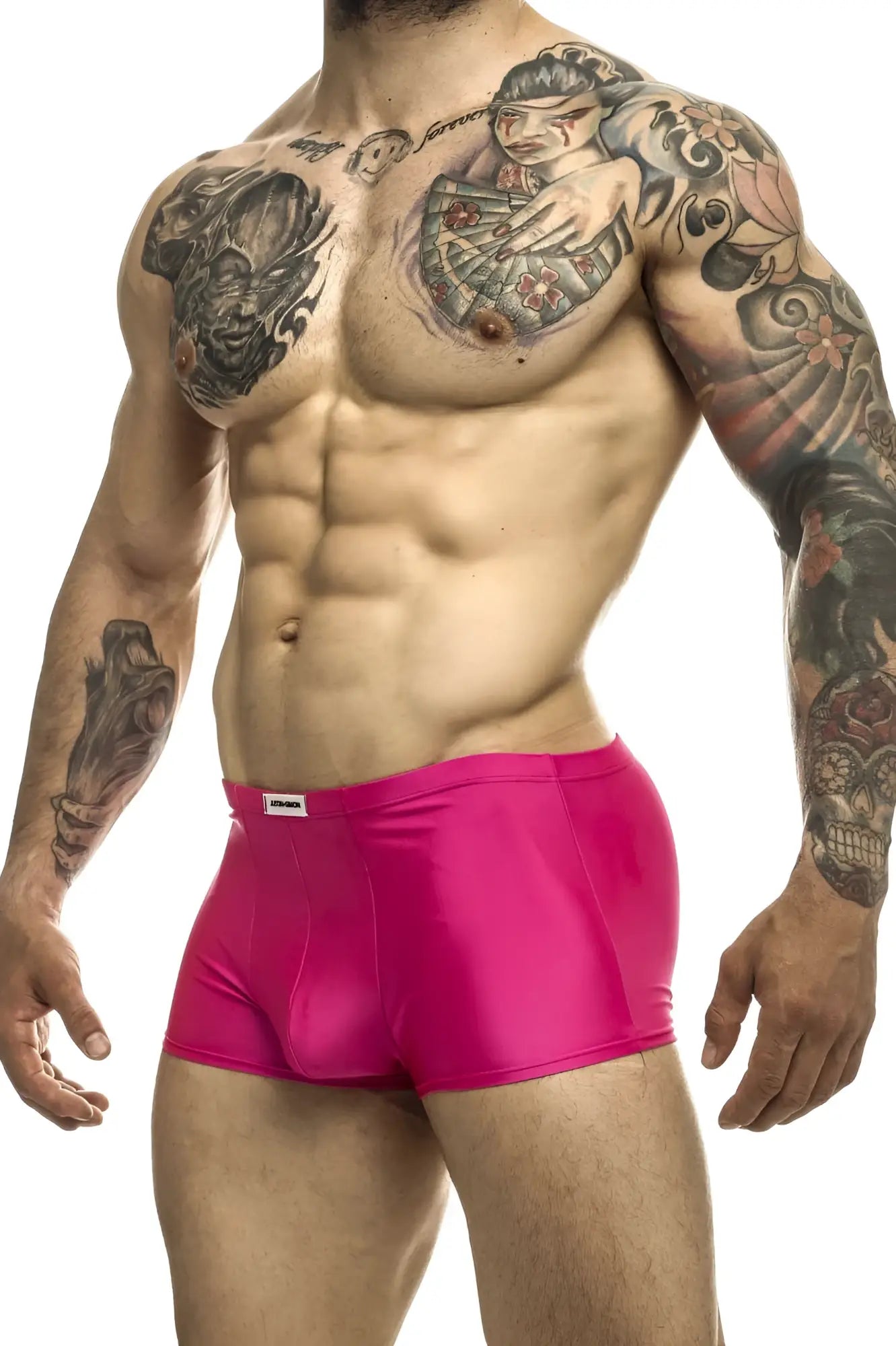 Bright pink shiny fabric briefs with white justin simon brand tag on waistband for classic trunks xsj08 model
