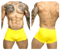 Bright yellow form-fitting men’s briefs with a small white brand tag at the waistband by JUSTIN+SIMON XSJ08 Classic Trunks