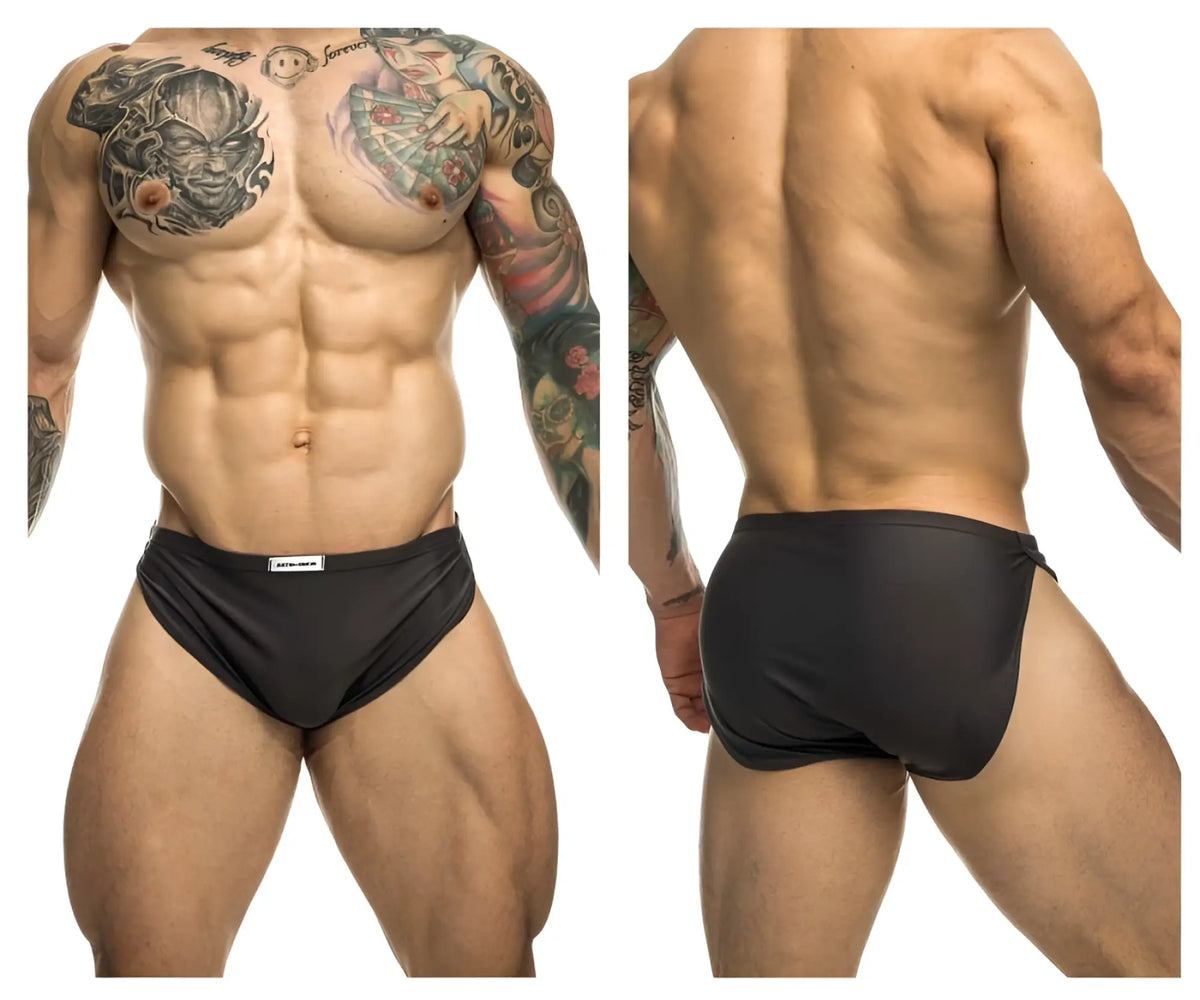 Black justin simon xsj09 athletic briefs with a small white brand tag on waistband suitable for running and sports