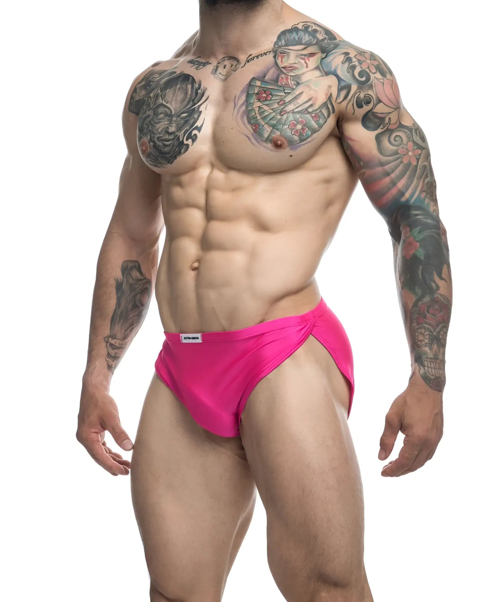 Bright pink JustIn Simon XSJ09 running briefs with a snug fit and a small white label at the waistband