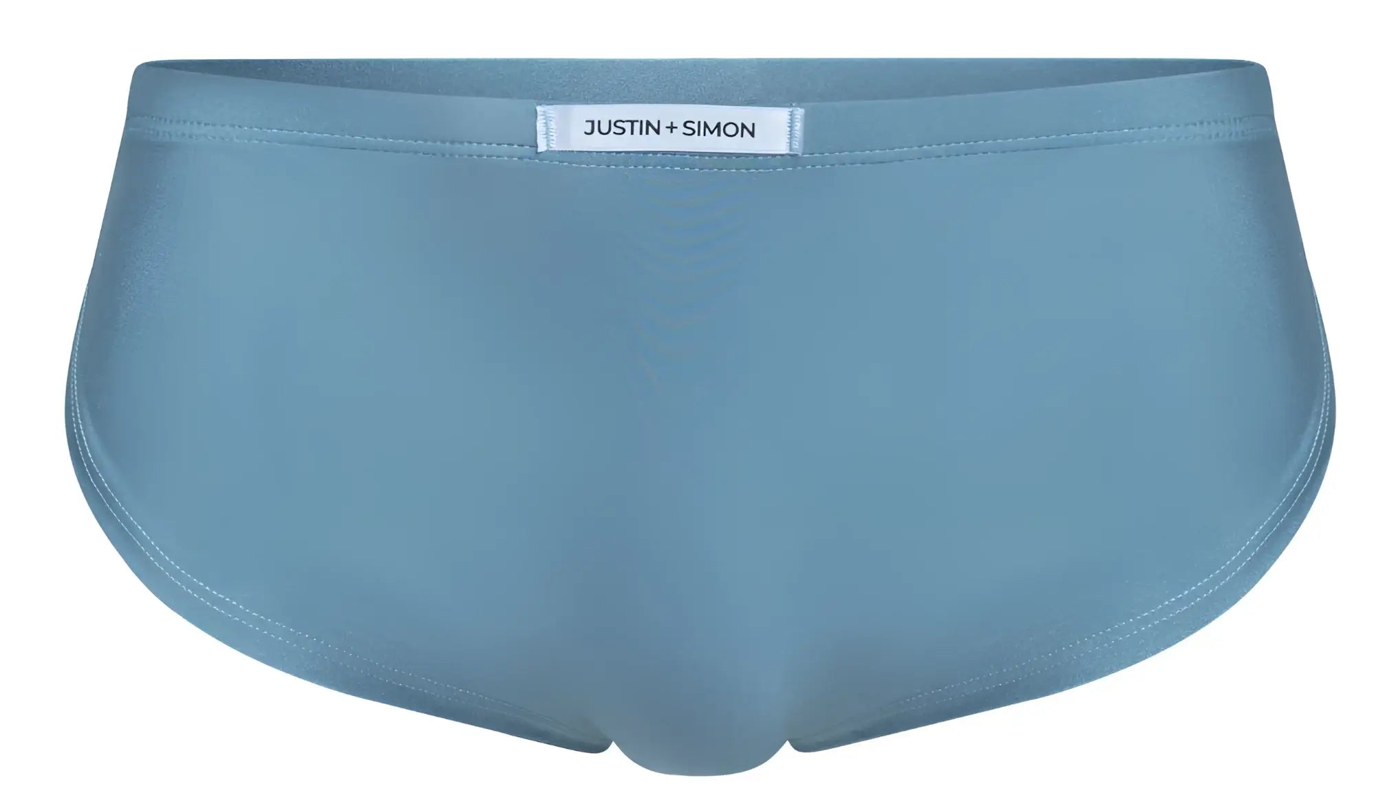 Light blue justin simon briefs with smooth seamless fabric finish paired with metal green xsj09 running shorts