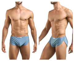 Light blue smooth textured men’s briefs with subtle side slit and white tag featured with JUSTIN SIMON XSJ09 running shorts metal green