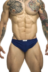 Navy blue justin simon xsj09 running shorts with a white brand label on the waistband for athletic use