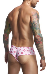 Justin simon XSJ22 cheek briefs in pink patterned swim trunks with playful bows and flowers design