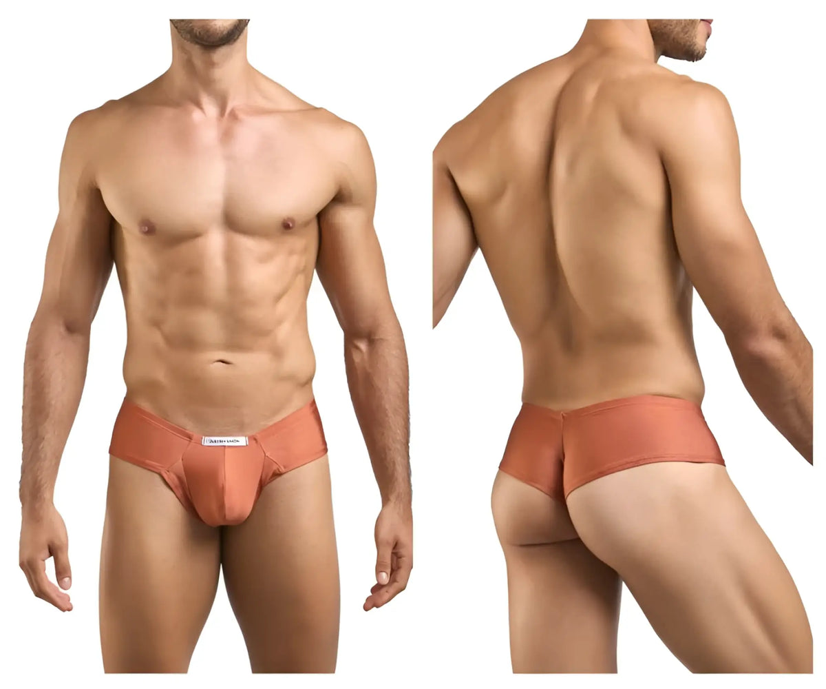 Justin simon xsj22 cheek briefs in ochre feature a sleek peach-colored fabric with a smooth finish and white label front