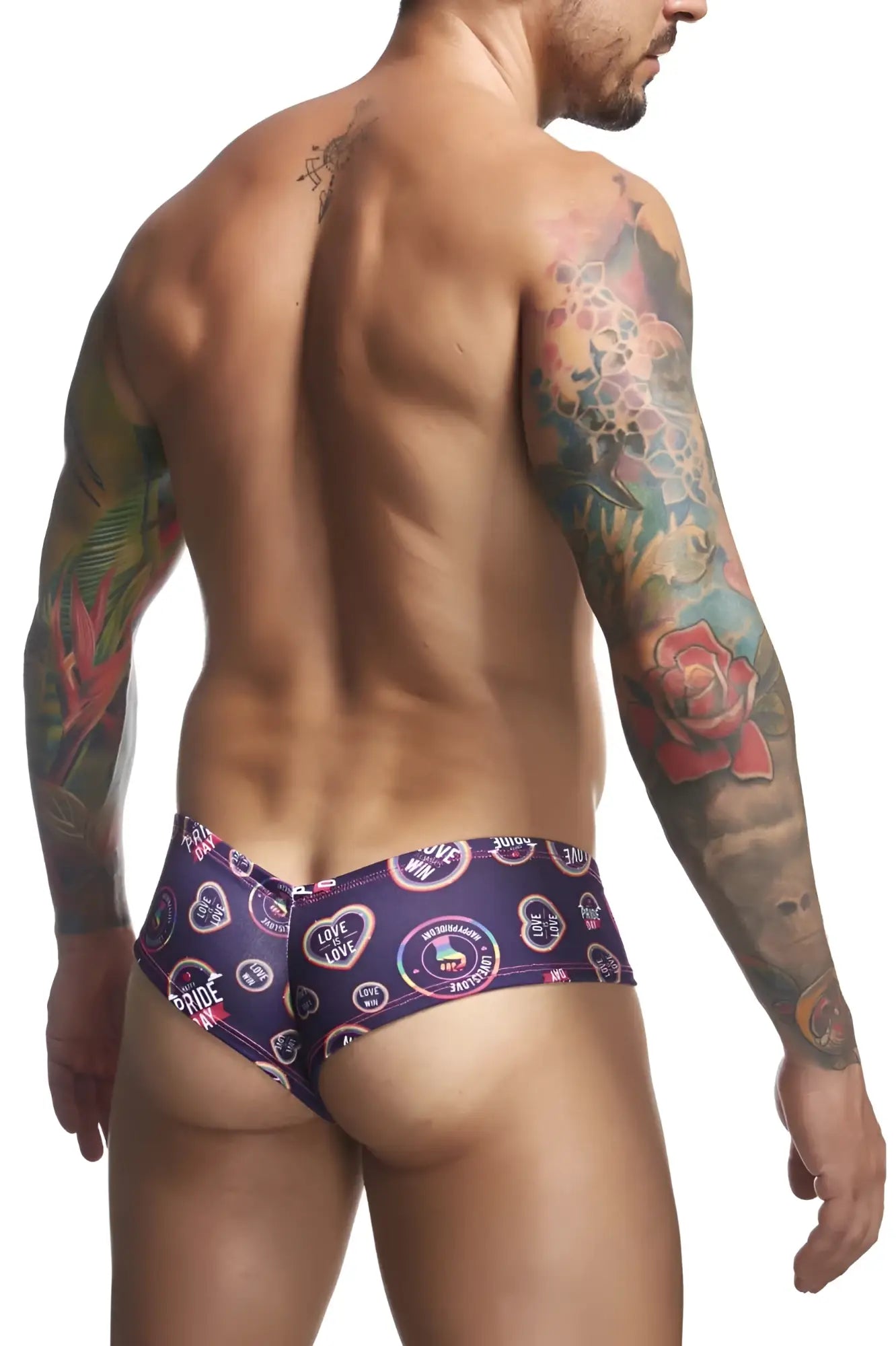 Purple patterned swim trunks with heart and love designs bold colorful print from justin simon xsj22 cheek briefs color pride