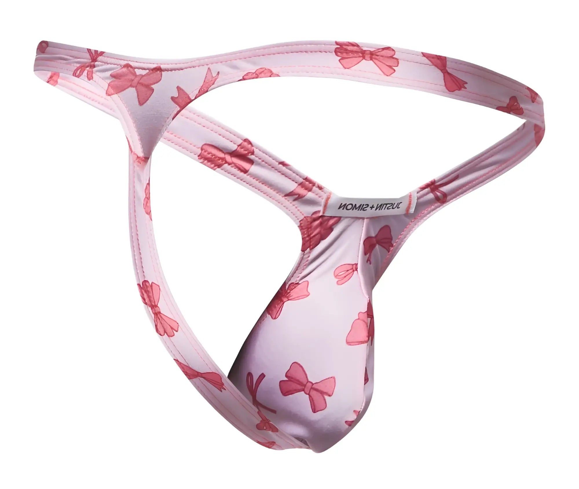Pink bow-patterned coquette bulge thong in soft stretchy fabric with branded tag by justin simon