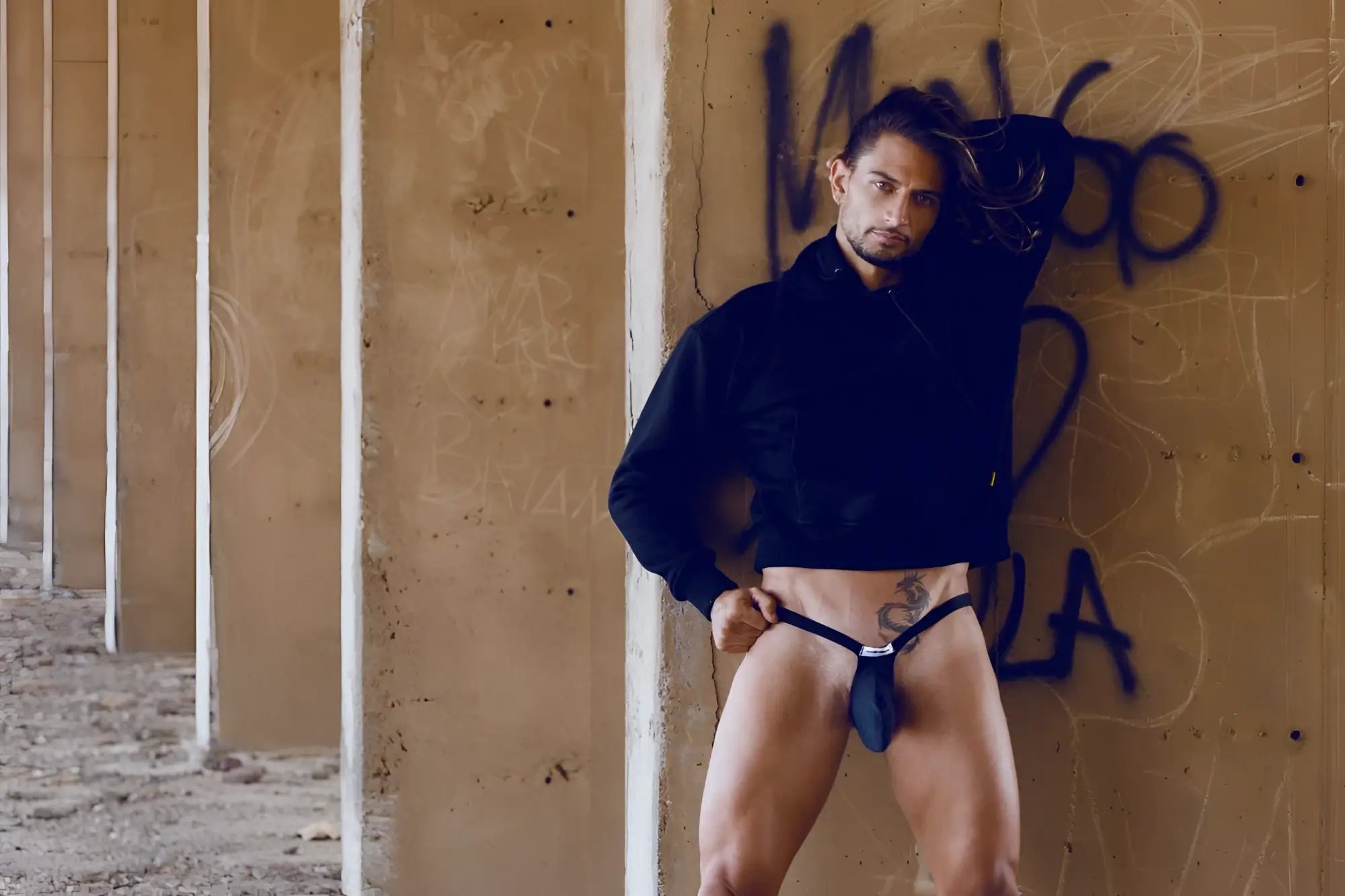 Black leather bulge thong with small silver buckle at front in opal green from justin simon xsjbu02 collection
