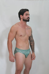 Kaleidoscope swim brief green patterned swim trunks with intricate geometric designs for beachwear