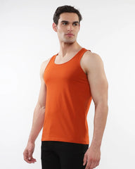 Orange sleeveless laser cut stretch jersey tank top showcasing breathable fabric and stylish design