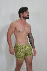 Bright yellow leopard fleece short swim trunks with a drawstring waistband for comfortable wear