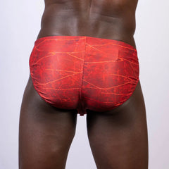 Red swim trunks lightning swim brief with marbled pattern designed for comfortable swimwear use