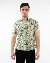 Lightweight cotton silk short-sleeved men’s shirt in light cream with yellow floral pattern and green leaves