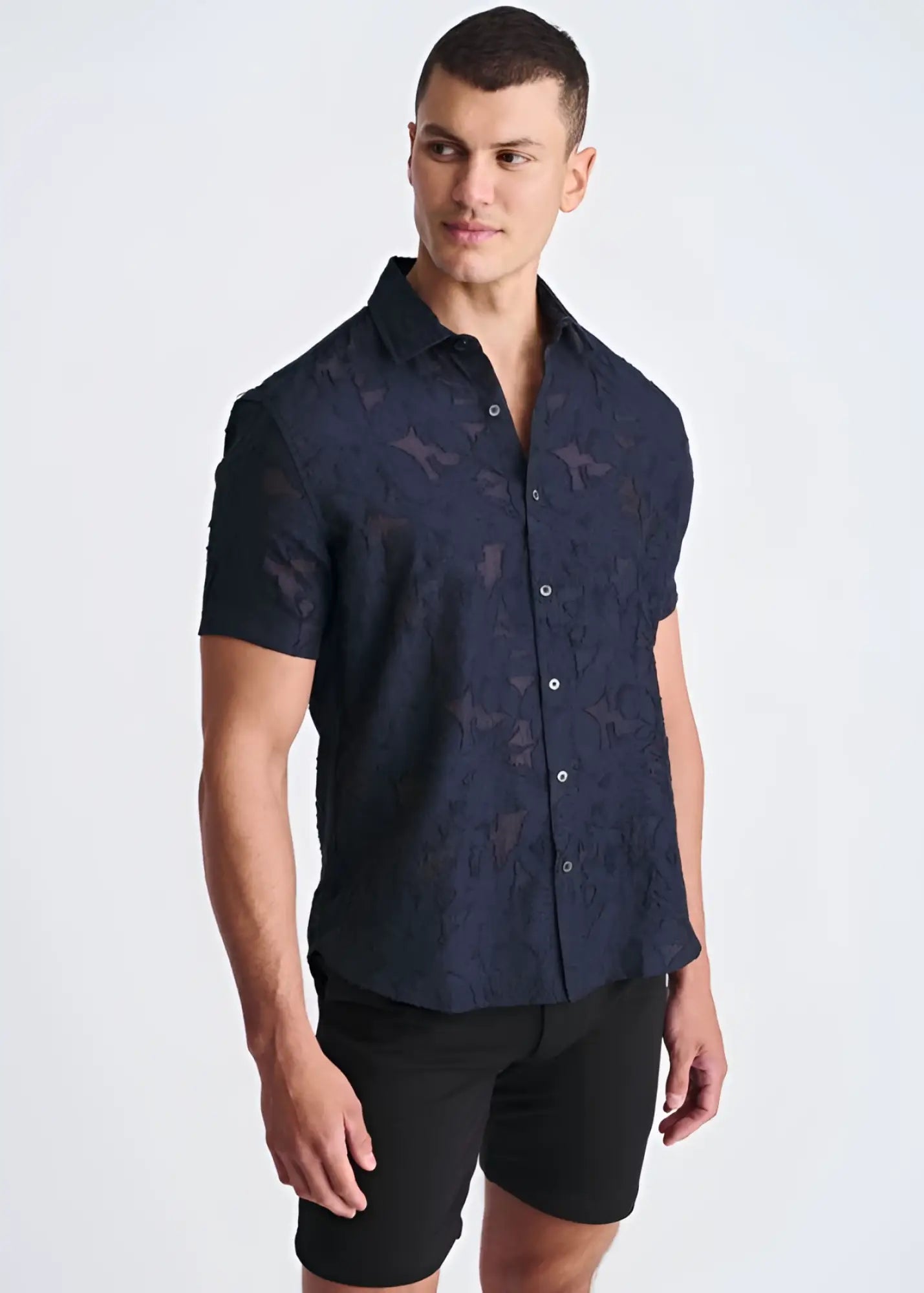 Lightweight jaquard short-sleeved button-up shirt in dark navy with a subtle textured star pattern