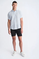 Light blue lightweight jaquard short-sleeved shirt with a subtle floral pattern perfect for warm weather wear
