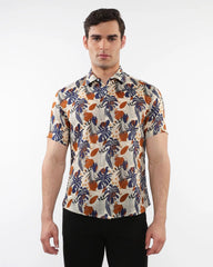 Men’s lightweight linen tencel short sleeve shirt with vibrant navy orange cream tropical leaf and fruit pattern on beige
